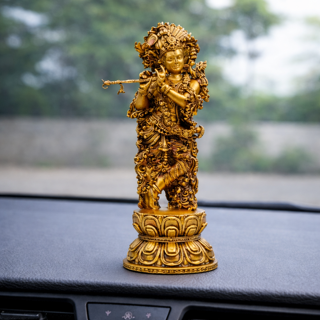 Shree Krishna idol placed on car dashboard for peace and guidance